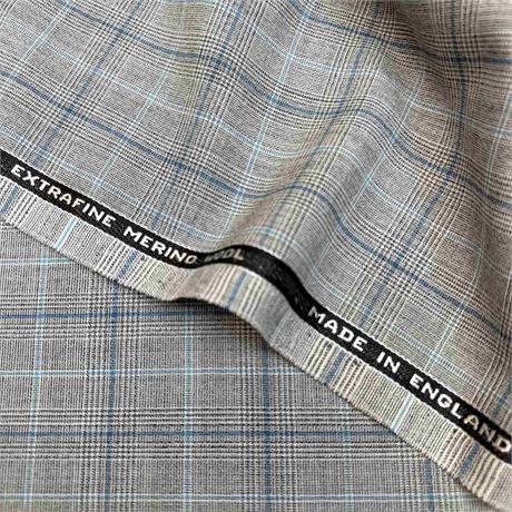 Aqua/grey checked suiting. Image 1