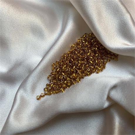 Toho Seed Beads - Silver Lined Transparent Honey Image 1
