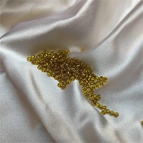 Toho Seed Beads - Silver Lined Chamomile Image 1