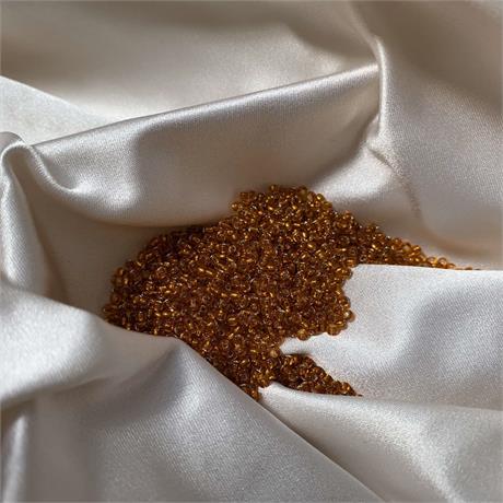 Toho Seed Beads - Silver Lined Marmalade Image 1